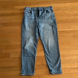 Light wash high rise mom jeans.